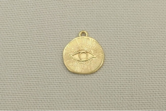 médaille œil doré