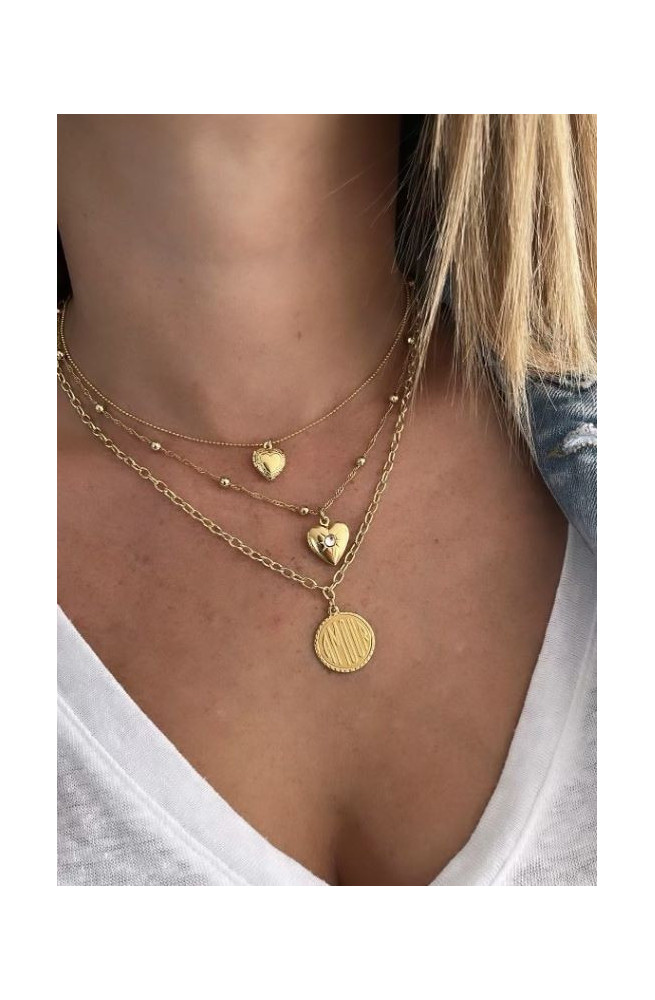 Pendentif secret cœur finition:Dore or fin 24 carats