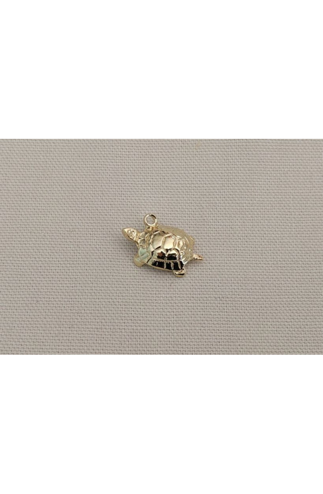 Tortue finition:Dore or fin 24 carats